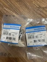 Mặt nạ nắp tay lắc Shimano ST-5700 Name Plate  & Fixing Screw